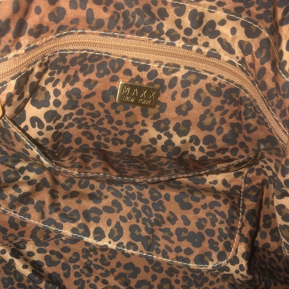 Maxx New York size medium large black leather brass detail perfect lining